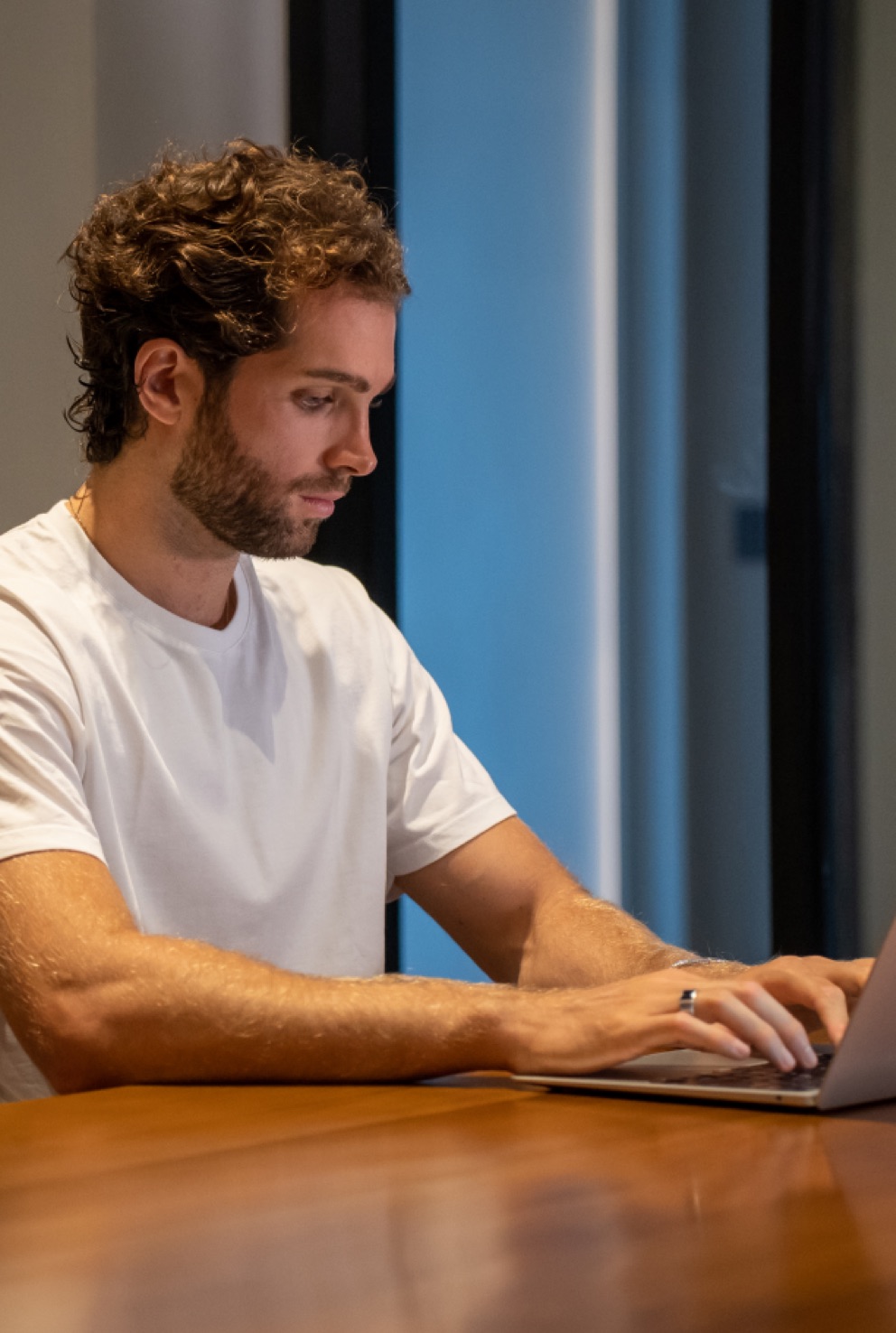 A member working at a desk at Saya Work coworking